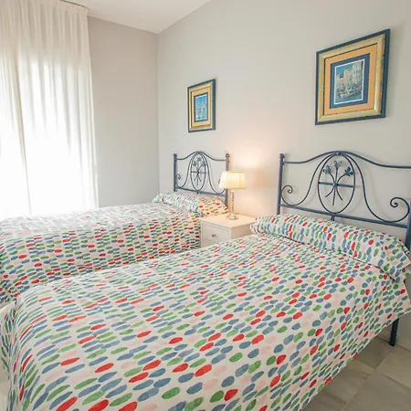 Piso Triana, * إشبيلية